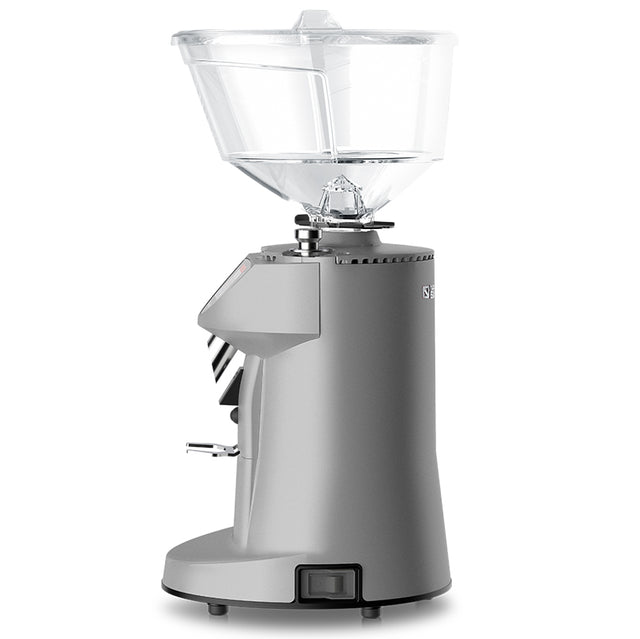 Silver coffee grinder with clear top on a white background