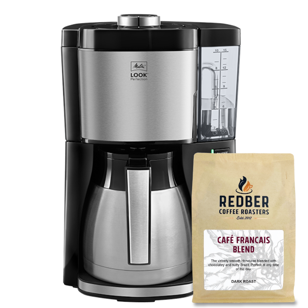 Coffee maker with a bag of Redber Coffee Roasters Cafe Français Blend on a white background