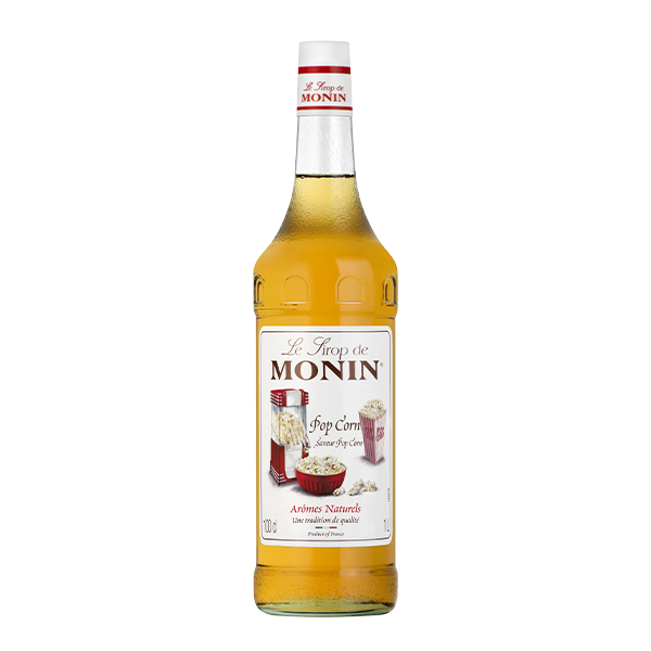 A bottle of Monin Popcorn flavor syrup with the label showing an illustration of a popcorn machine and text indicating the product name and size.