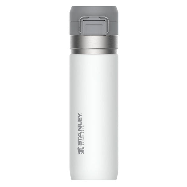 A white Stanley Quick-Flip water bottle with a gray lid, designed for insulation and easy hydration on the go.