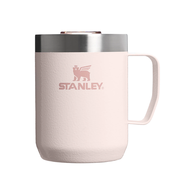 Pink Stanley mug with a silver lid on a white background