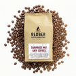 Redber Coffee Roasters package surrounded by coffee beans on a white background