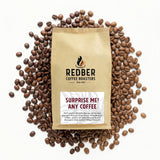 Redber Coffee Roasters package surrounded by coffee beans on a white background