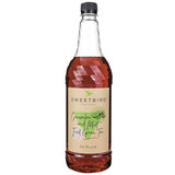 Bottle of Sweetbird Cucumber and Mint Iced Green Tea syrup on a white background