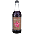 Bottle of Sweetbird Rose syrup on a white background
