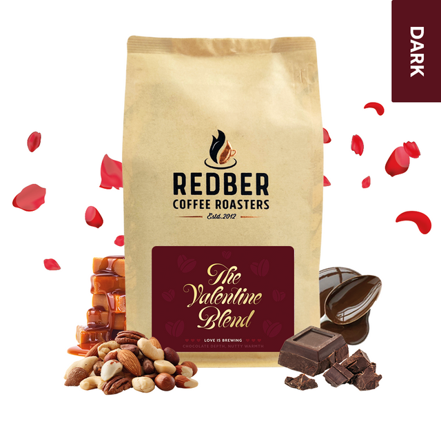 Redber Coffee Roasters Valentine Blend coffee bag with chocolate, nuts, and candy on a white background