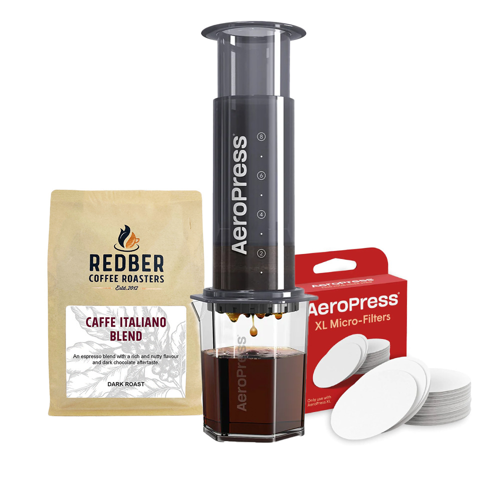 The image shows an AeroPress XL Coffee Maker with a bundle of 250g free coffee and filters. The coffee maker is black, with a clear carafe and a pack of beans labeled 'Caffè Italiano Blend' beside it.