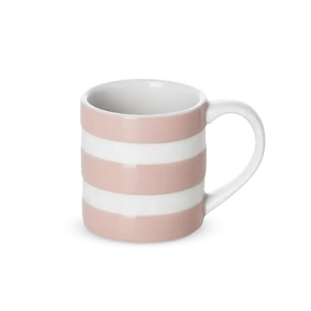 Pink and white striped mug on a white background