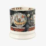 Emma Bridgewater All Hallows Eve 1/2 Pint Mug – side view showing carved pumpkins on a brick wall