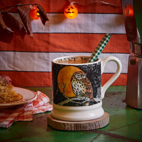 Emma Bridgewater Harvest Moon 1/2 Pint Mug – autumn lifestyle setting with the mug on a wooden coaster