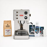 Espresso machine with Redber coffee beans and cleaning products on a white background